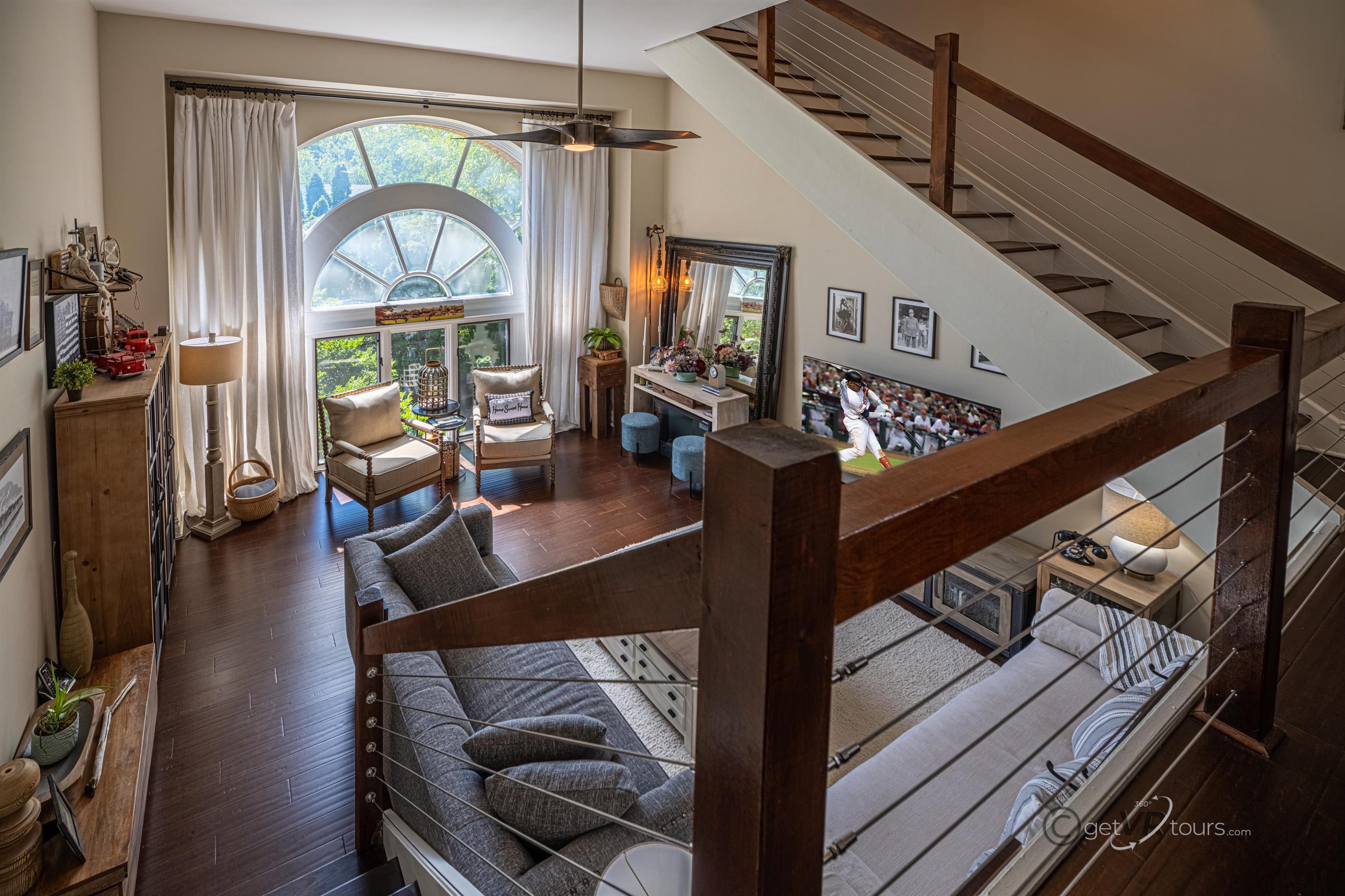 411 South Prospect Street Galena, IL 61036 - Photo 10 of 28 a view of a dining room with furniture a chandelier and wooden floor