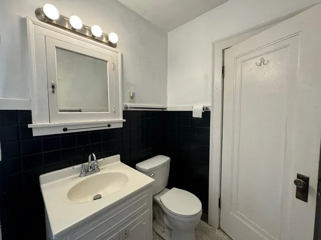 a bathroom with a sink and a toilet