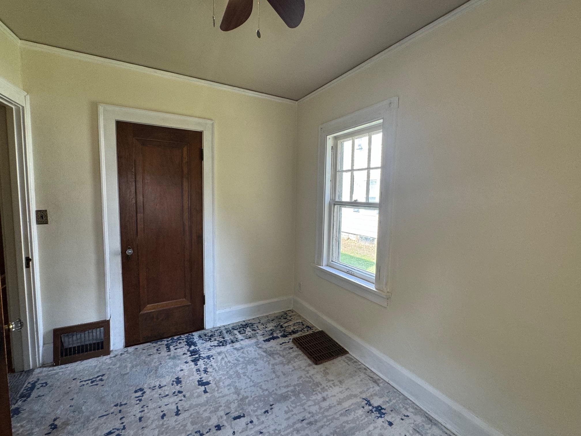 2231 9th Avenue Rockford, IL 61104 - Photo 22 of 44 a bedroom with a bed and a window