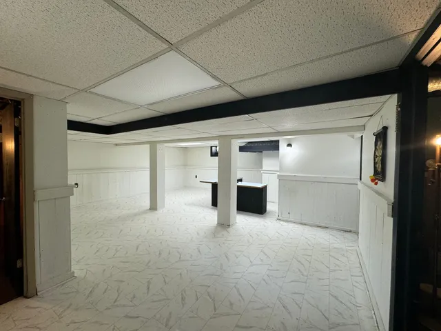 a view of staircase with a rug