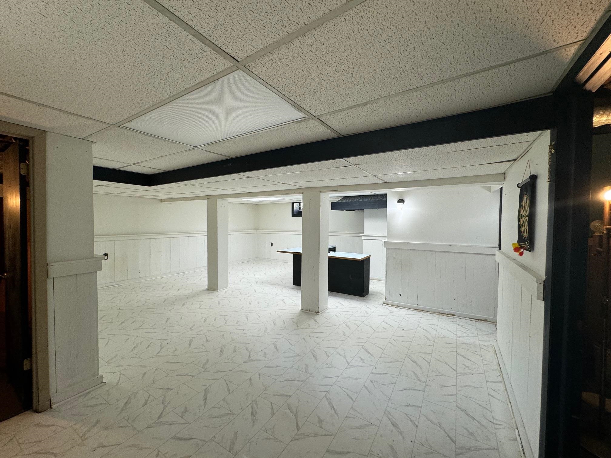 2231 9th Avenue Rockford, IL 61104 - Photo 30 of 44 a view of an empty room with a kitchen