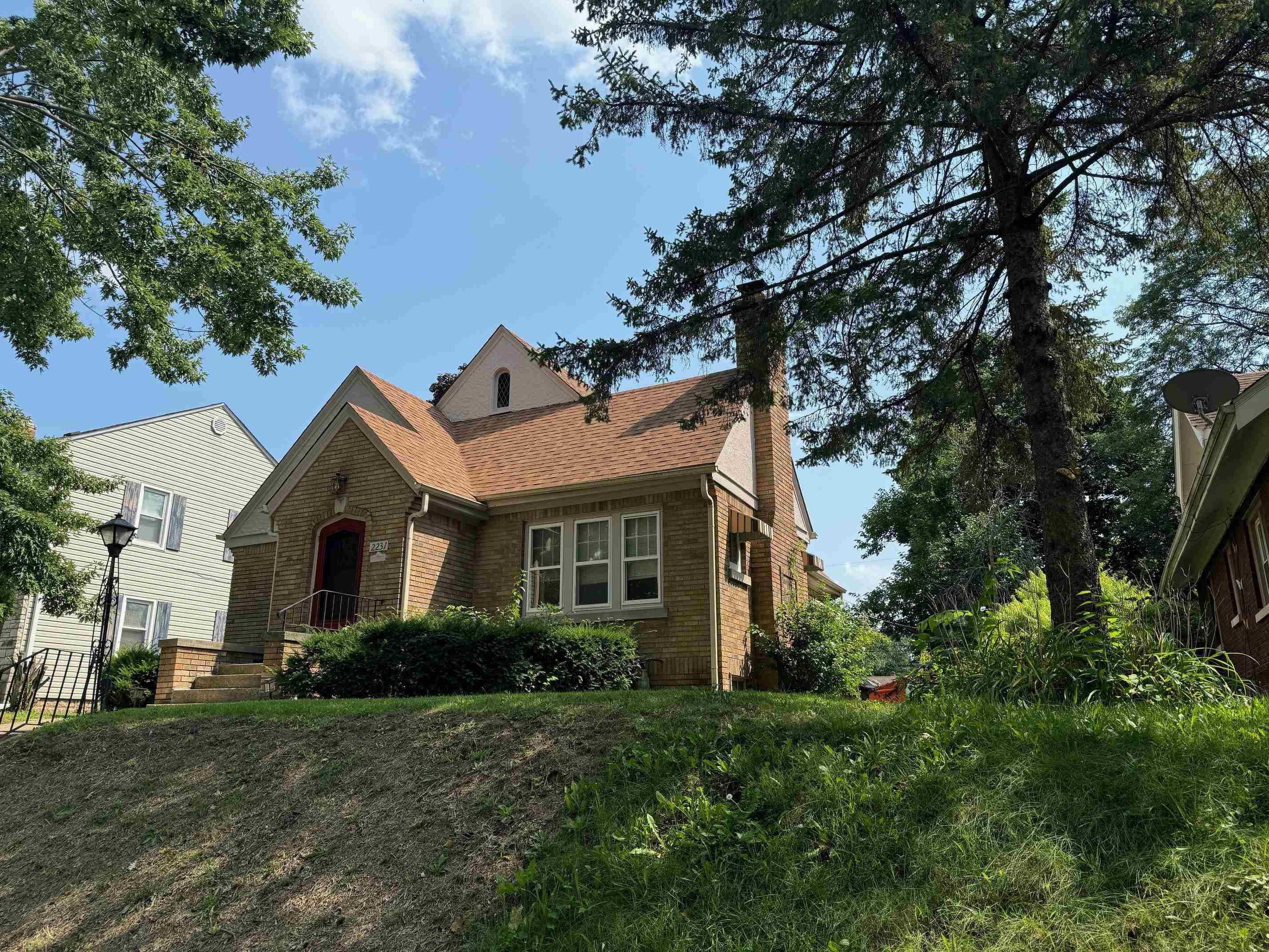 2231 9th Avenue Rockford, IL 61104 - Photo 34 of 44 a front view of a house with a yard