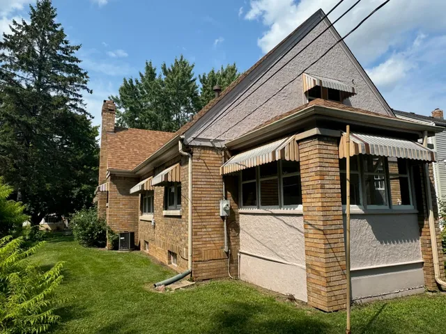 a view of a backyard with a garden