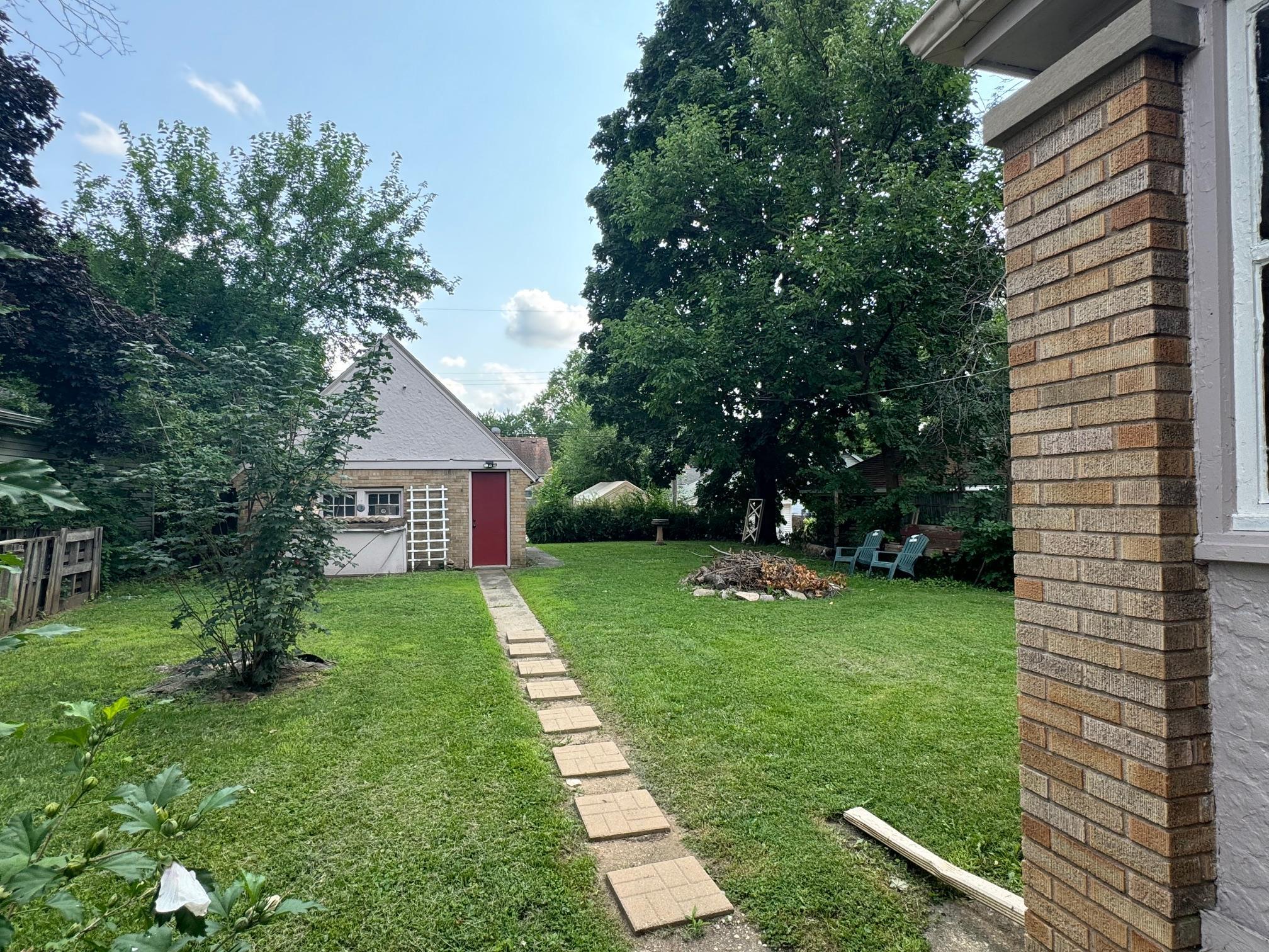 2231 9th Avenue Rockford, IL 61104 - Photo 38 of 44 a view of a backyard with a garden