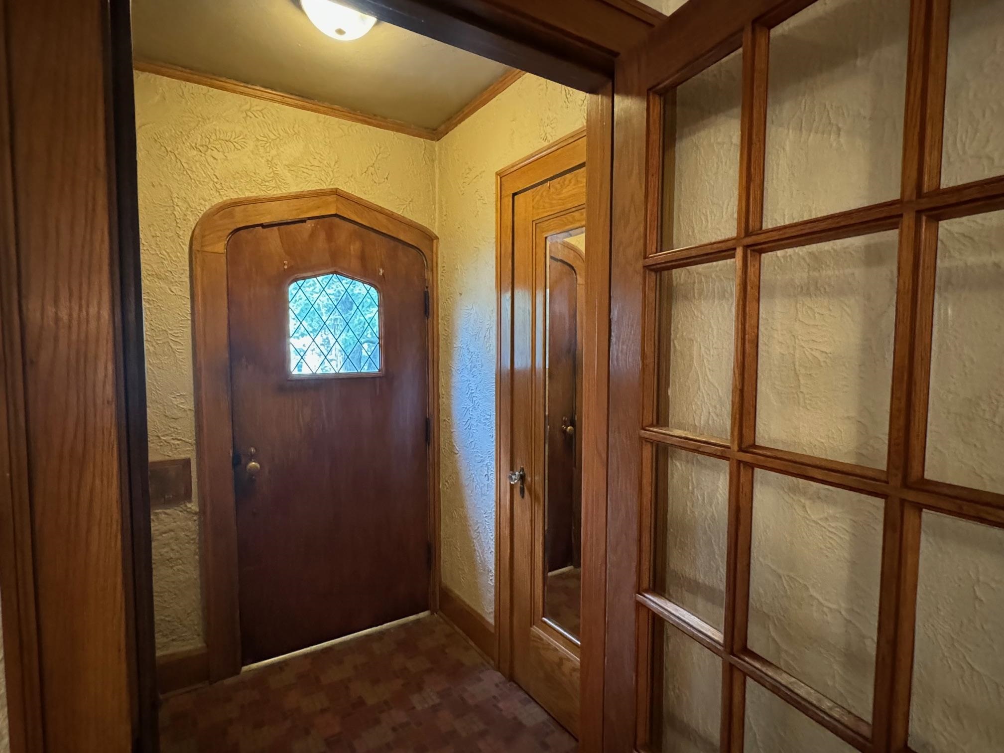 2231 9th Avenue Rockford, IL 61104 - Photo 4 of 44 a view of a hallway with wooden floor