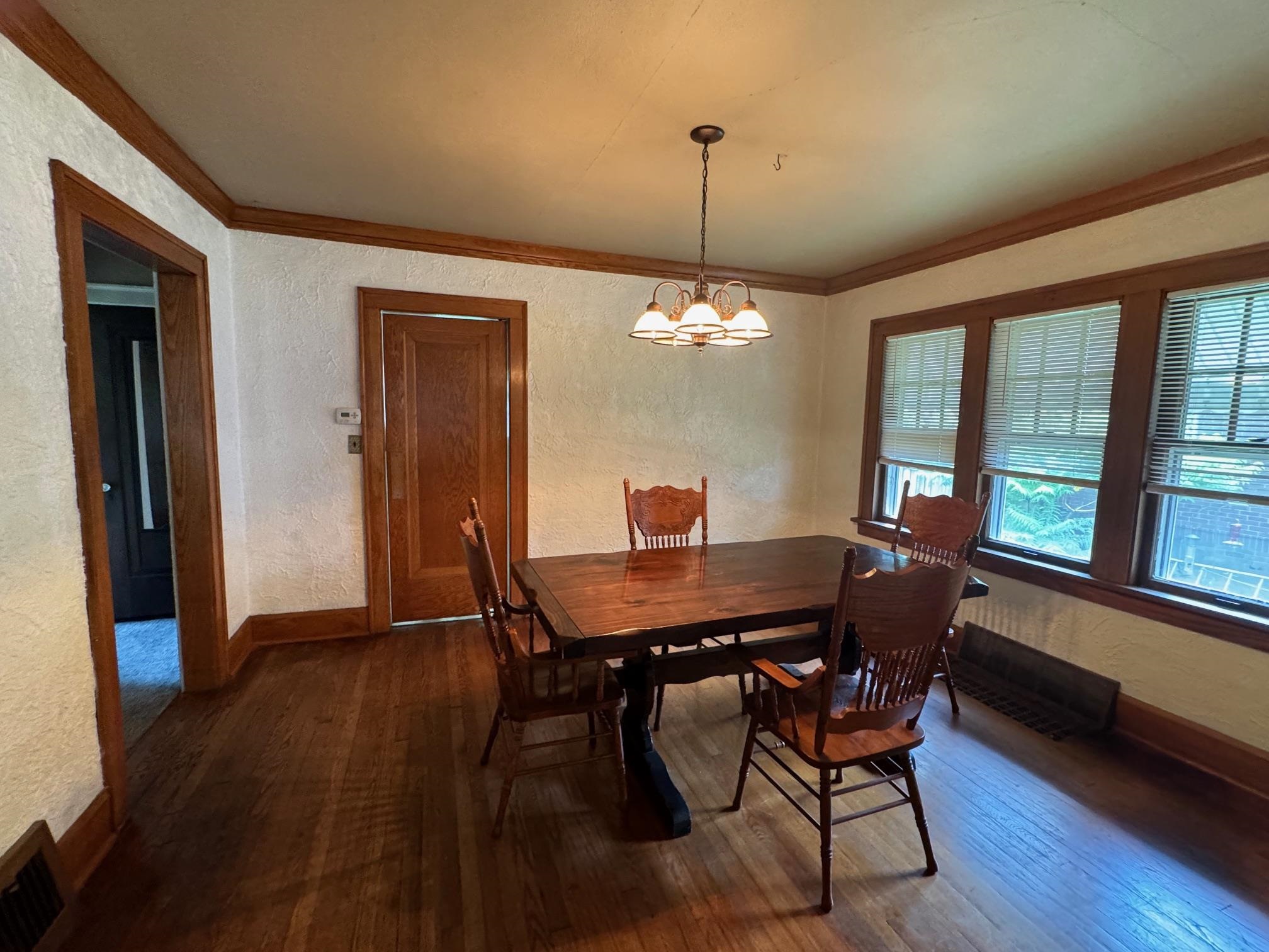 2231 9th Avenue Rockford, IL 61104 - Photo 8 of 44 a view of a dining room with furniture window and wooden floor