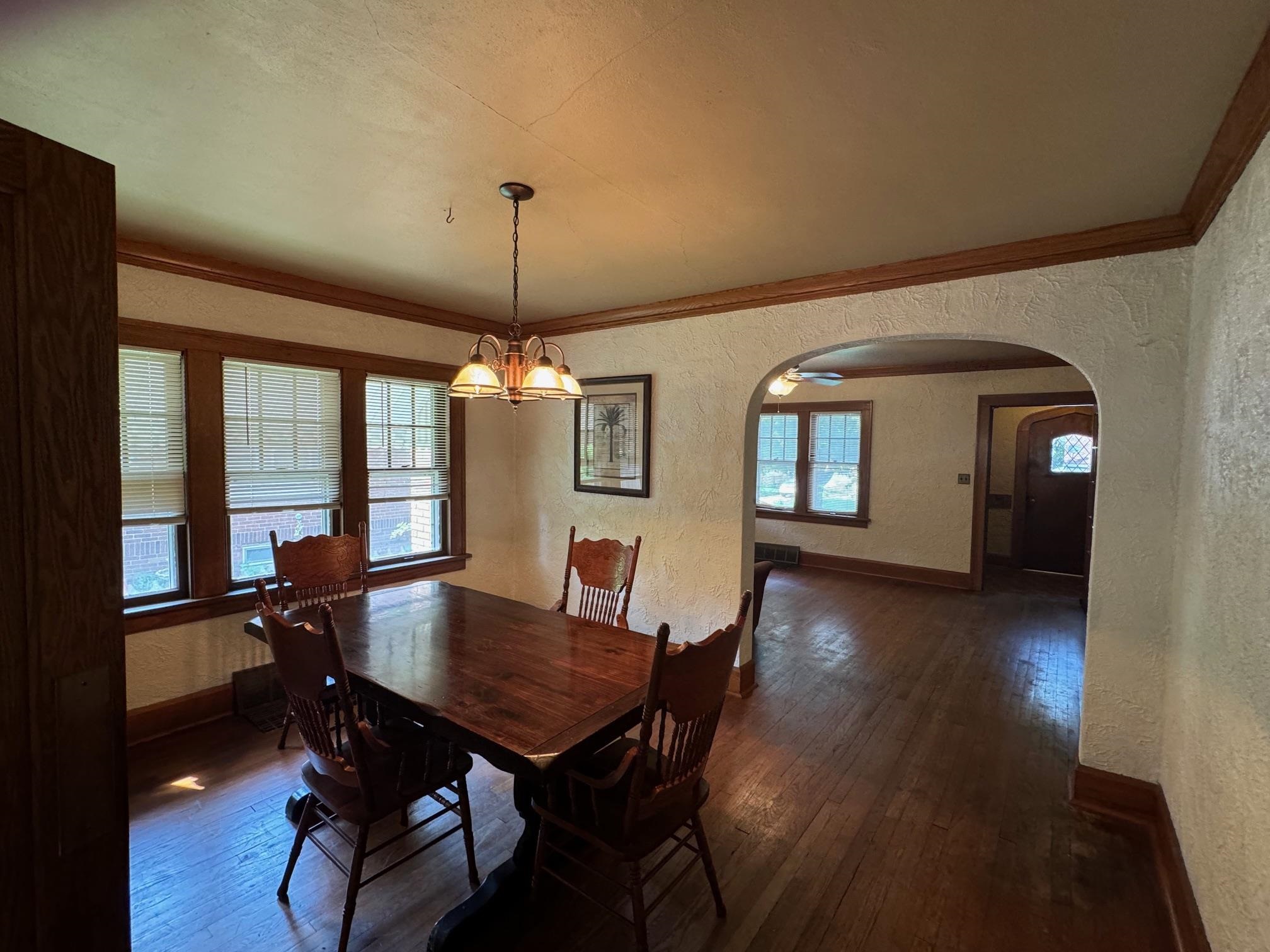 2231 9th Avenue Rockford, IL 61104 - Photo 10 of 44 a view of a dining room with furniture window and wooden floor