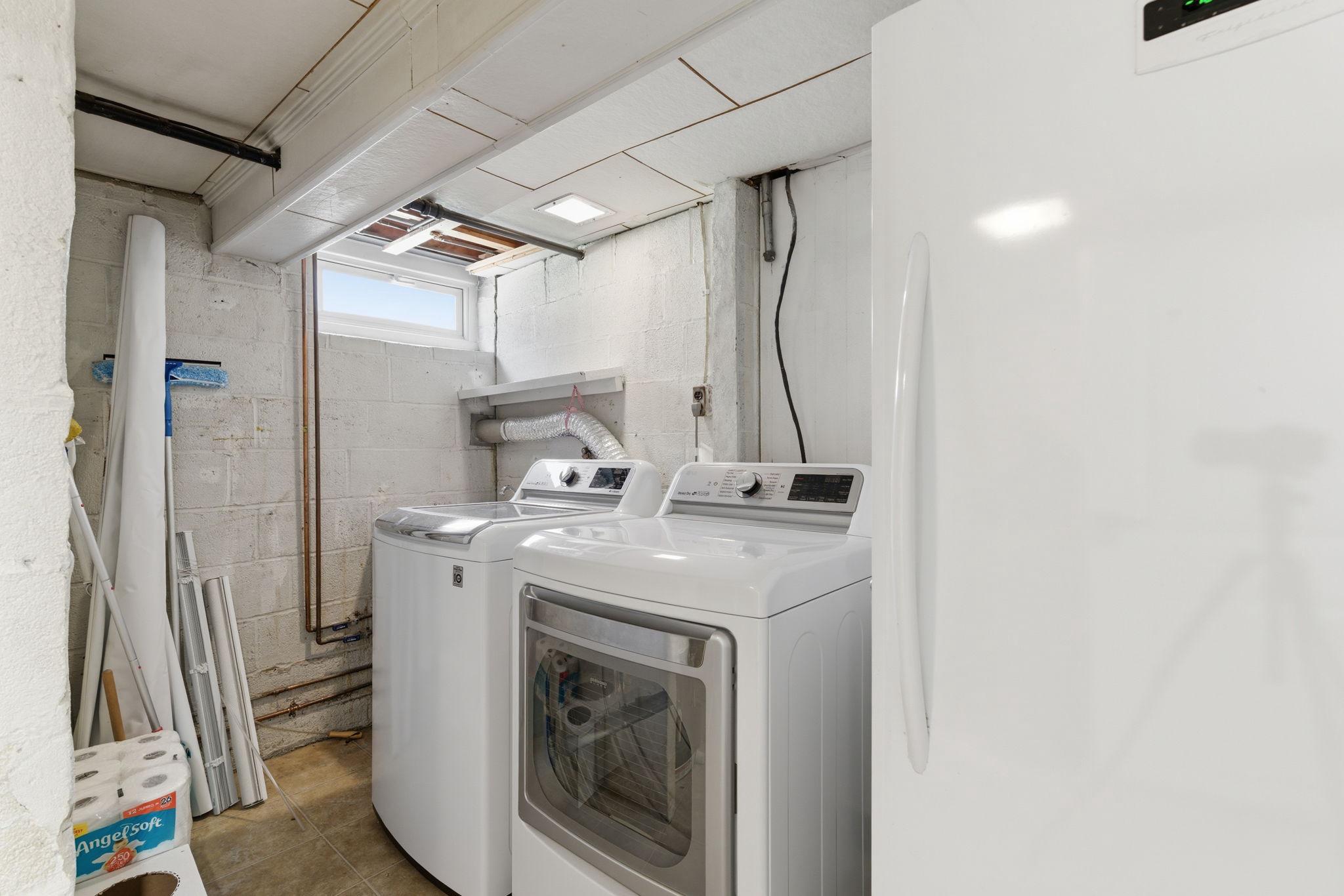 305 Gralan Road Catonsville, MD 21228 - Photo 30 of 38 Laundry with freezer and utility room