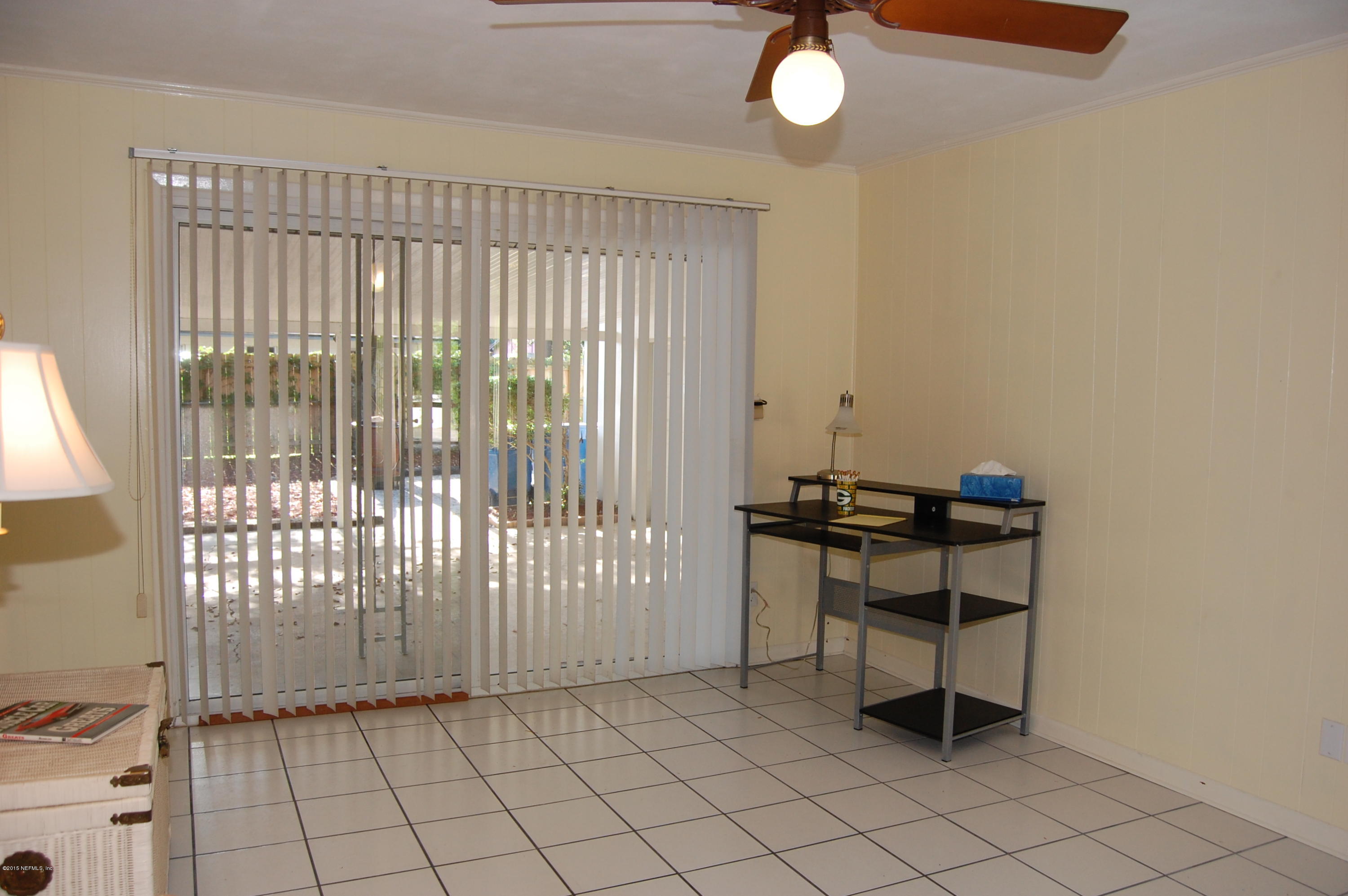 3734 Gurley Road Jacksonville, FL 32277 - Photo 19 of 38 a view of a room with a table and a chair