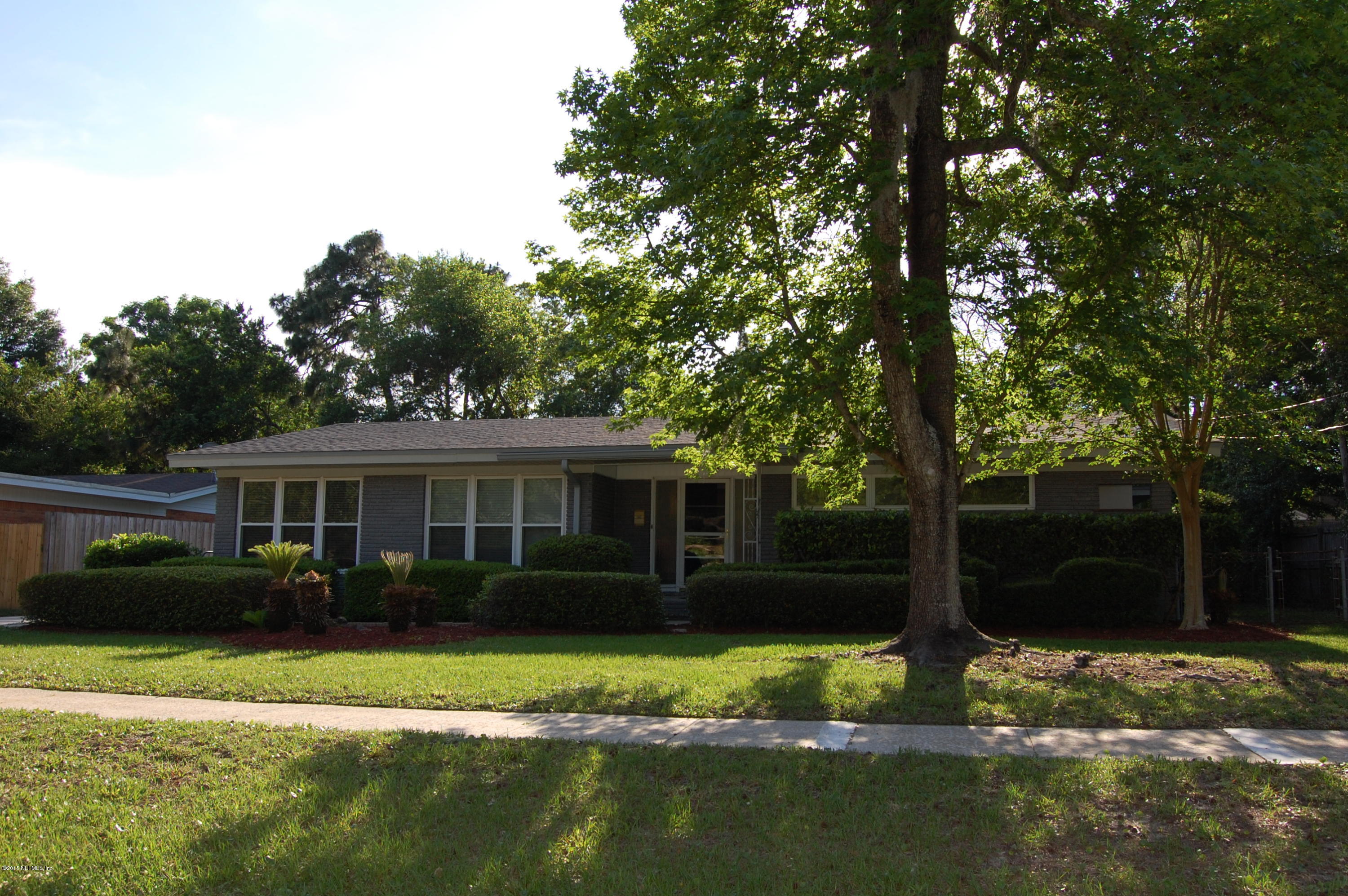 3734 Gurley Road Jacksonville, FL 32277 - Photo 3 of 38 a view of a house with backyard and sitting area