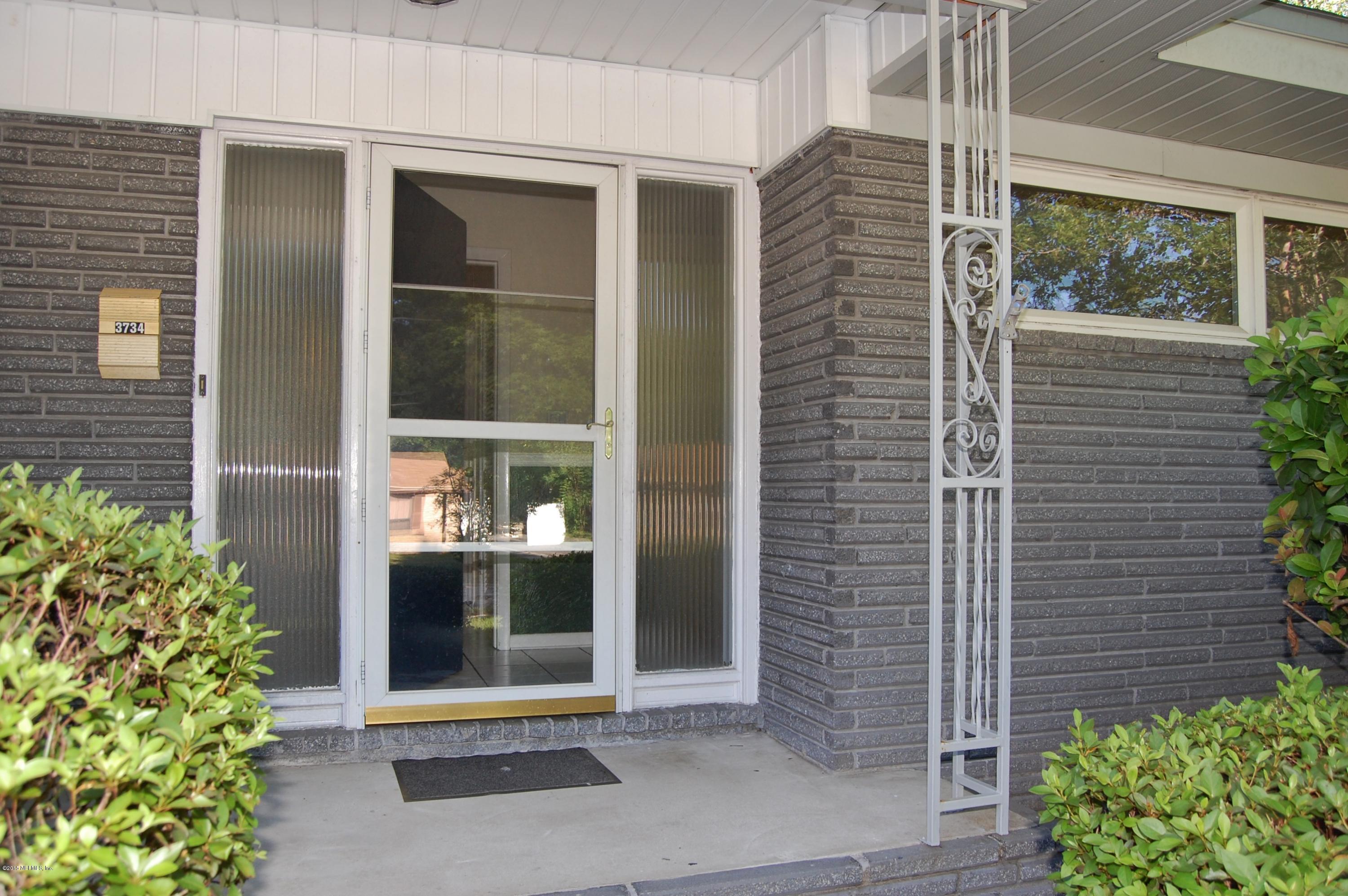 3734 Gurley Road Jacksonville, FL 32277 - Photo 5 of 38 a view of a door of the house