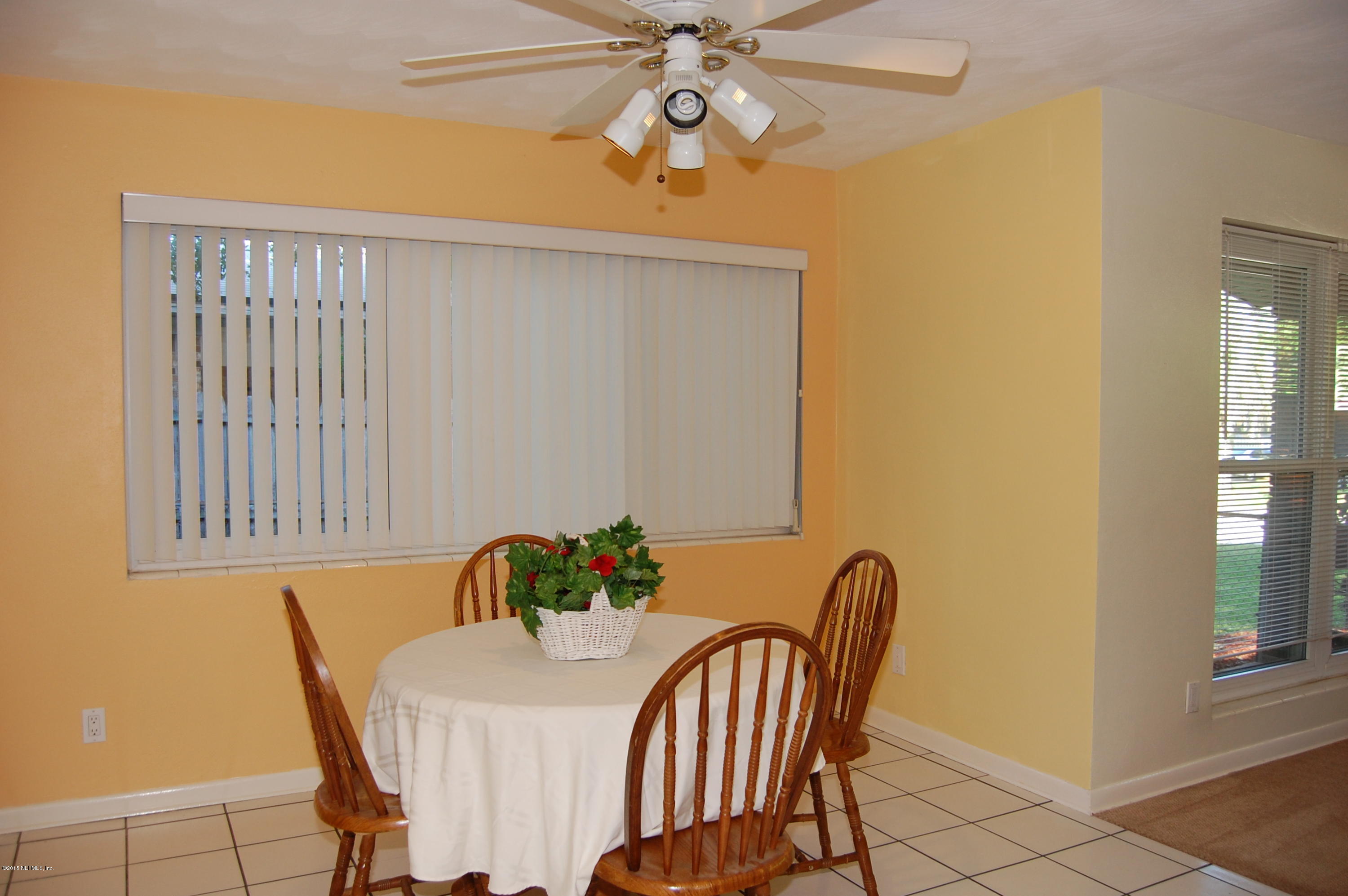 3734 Gurley Road Jacksonville, FL 32277 - Photo 10 of 38 a dining room with furniture and window