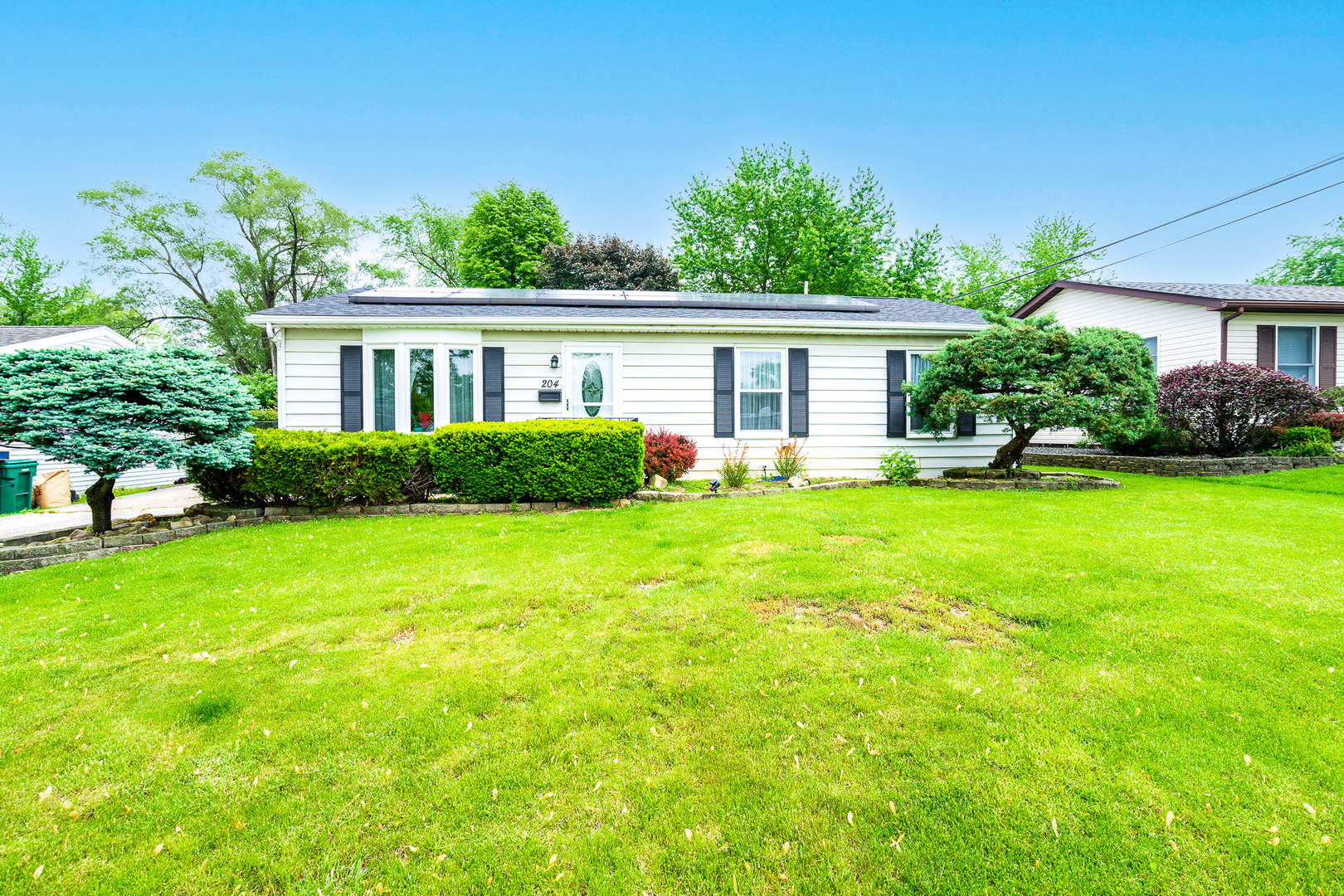 204 MacIntyre Street Lockport, IL 60441 - Photo 1 of 27 a front view of house with yard and green space