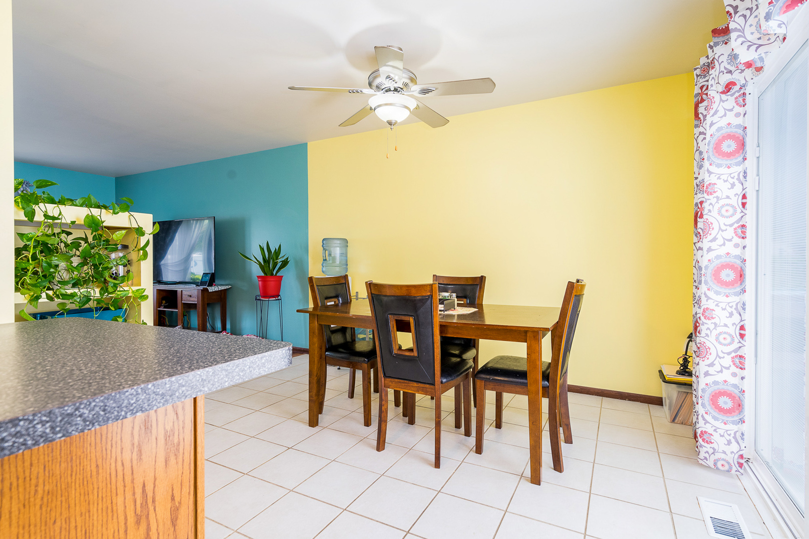 204 MacIntyre Street Lockport, IL 60441 - Photo 11 of 27 a view of a dining room with furniture and a chandelier