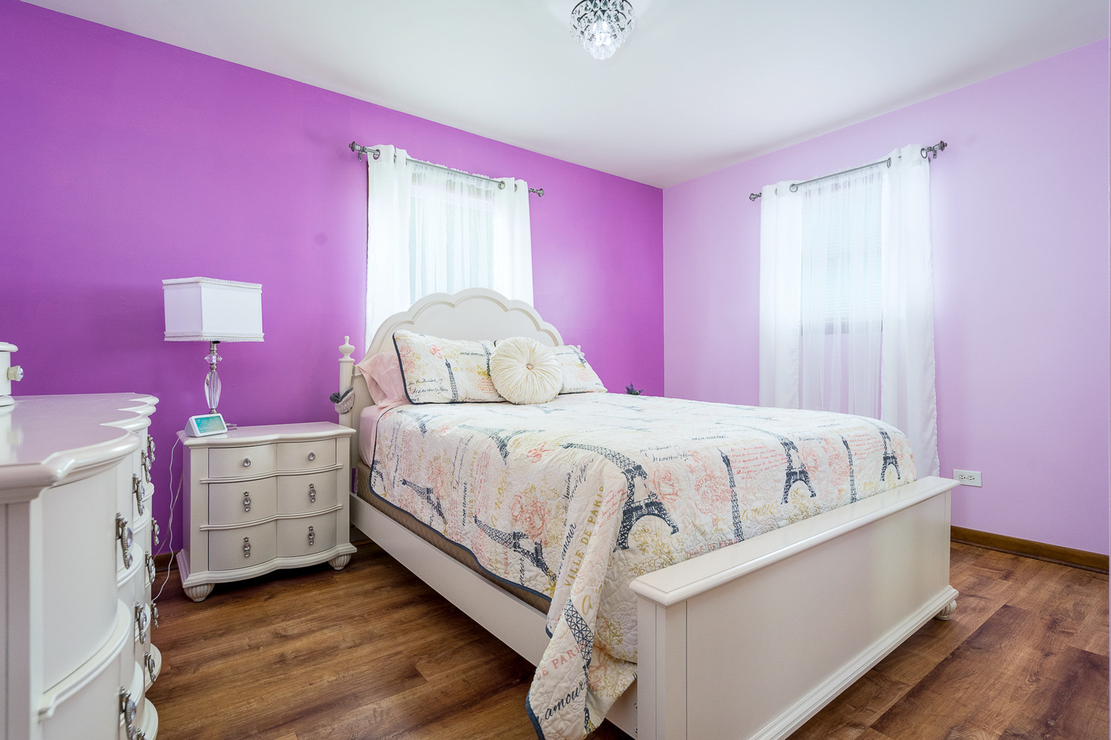204 MacIntyre Street Lockport, IL 60441 - Photo 12 of 27 a large bed sitting in a bedroom next to a window