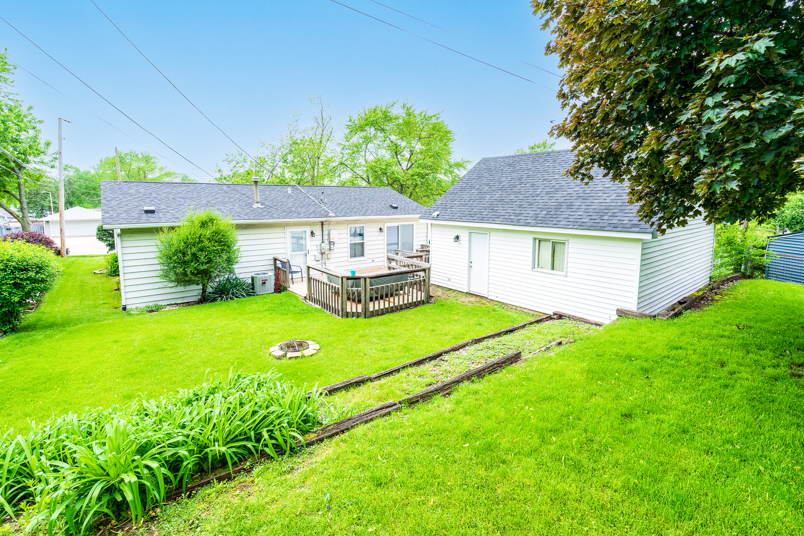 204 MacIntyre Street Lockport, IL 60441 - Photo 22 of 27 a aerial view of a house with garden