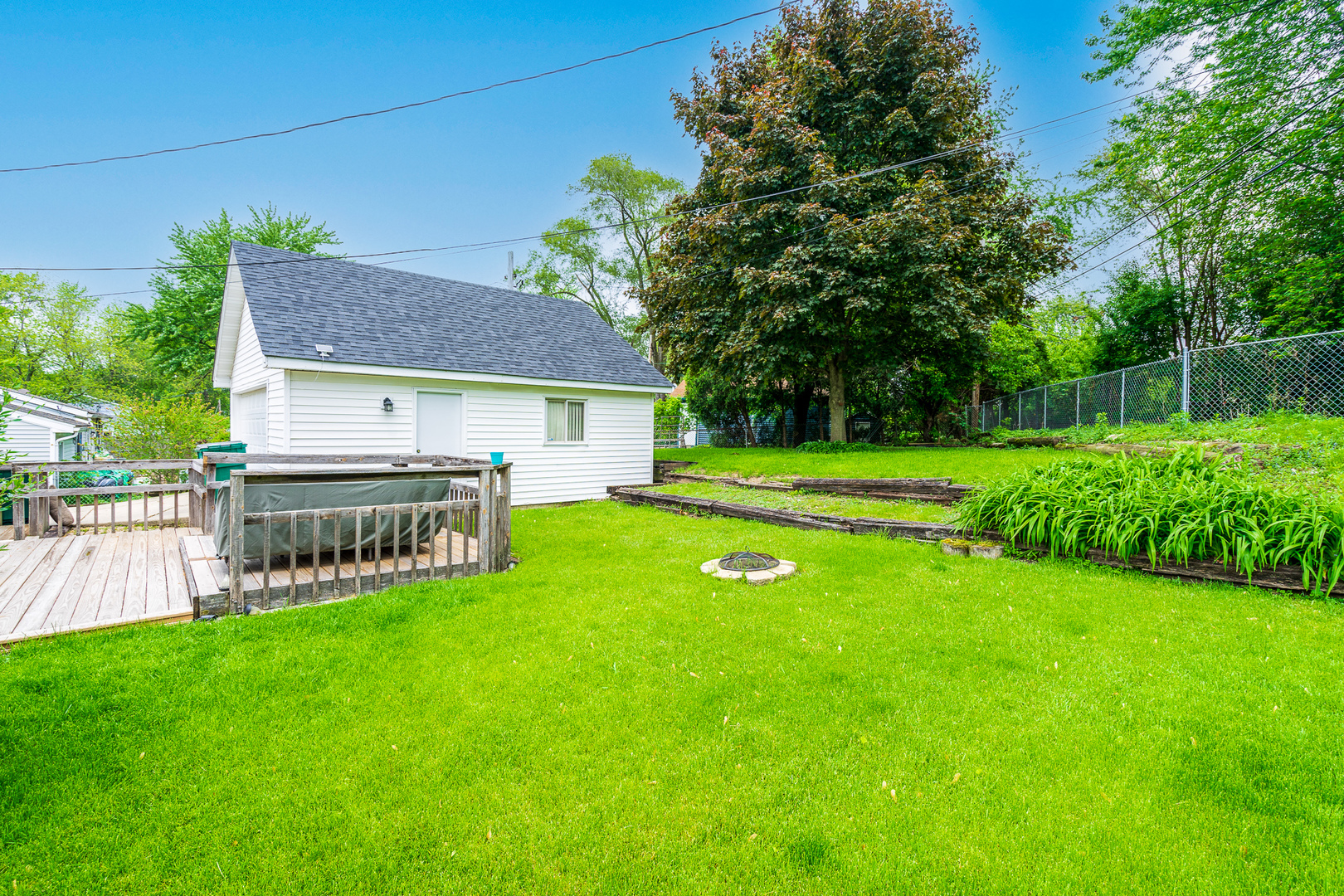 204 MacIntyre Street Lockport, IL 60441 - Photo 26 of 27 a view of a house with a yard and sitting area