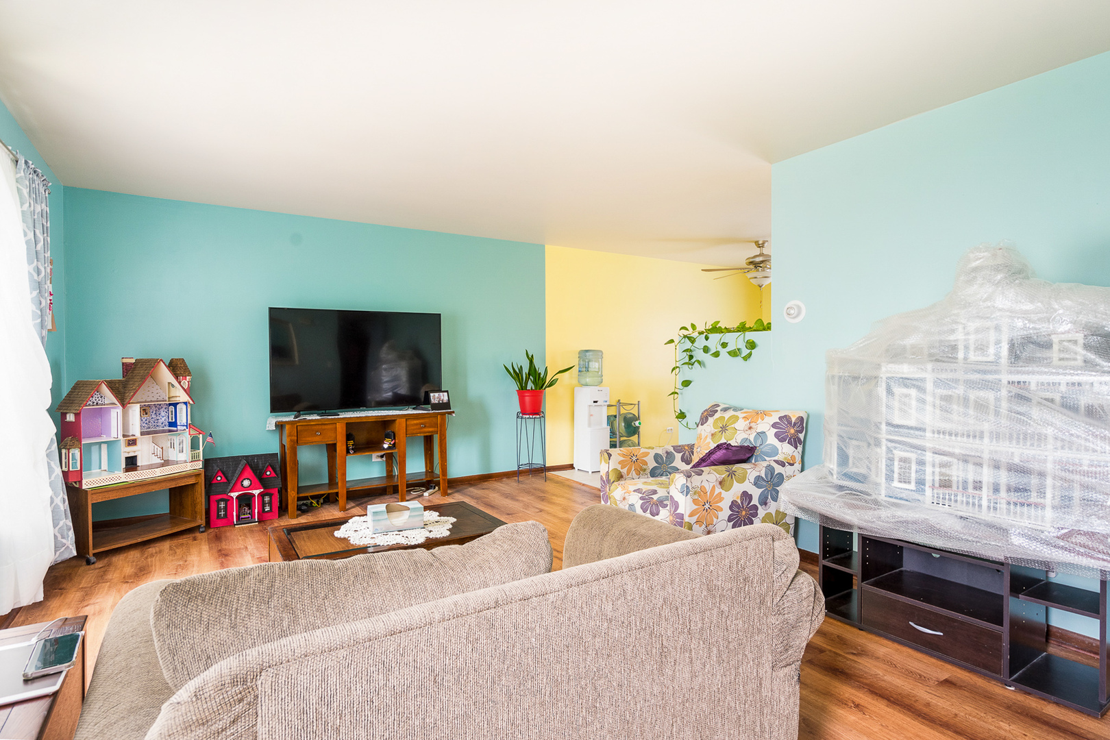 204 MacIntyre Street Lockport, IL 60441 - Photo 6 of 27 a bed room with furniture and a flat screen tv