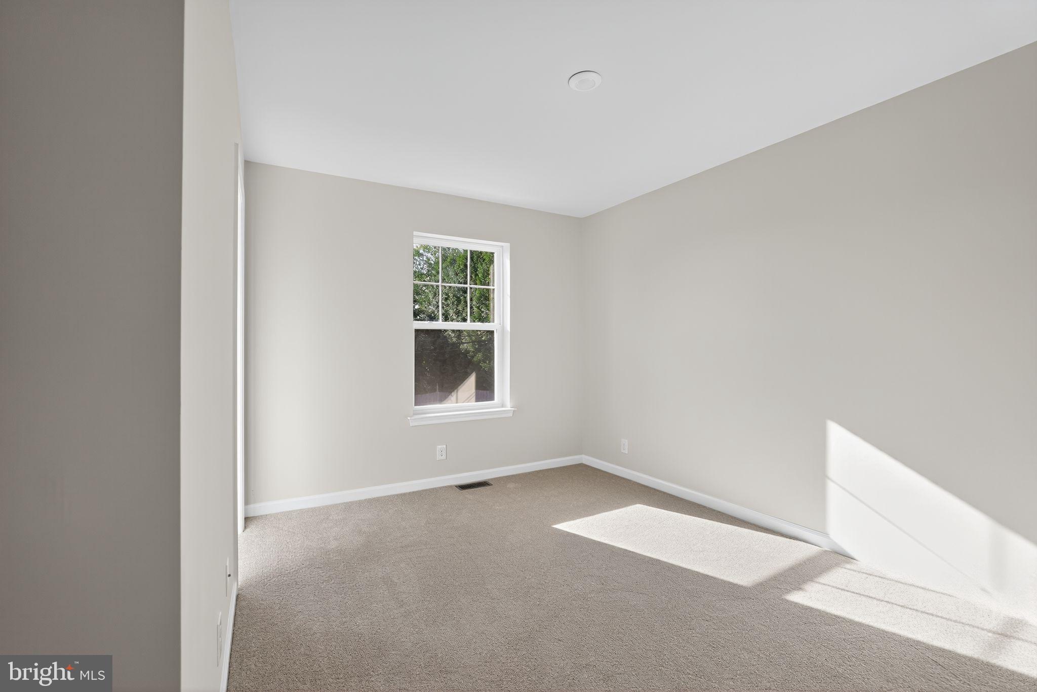 102 High Street Dublin, PA 18917 - Photo 13 of 24 an empty room with a window