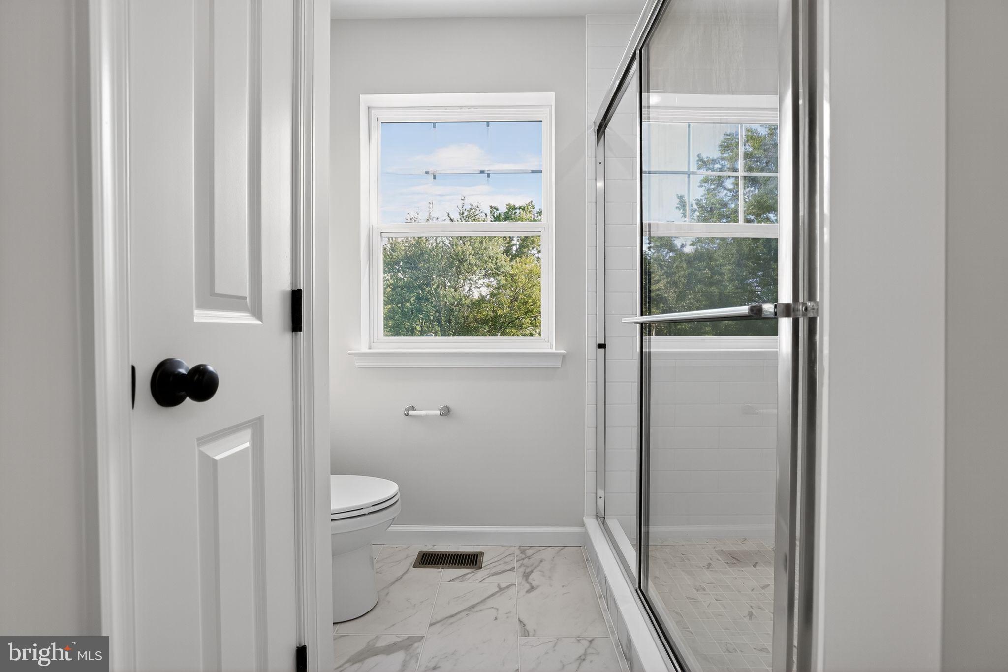 102 High Street Dublin, PA 18917 - Photo 20 of 24 a bathroom with a toilet sink and shower