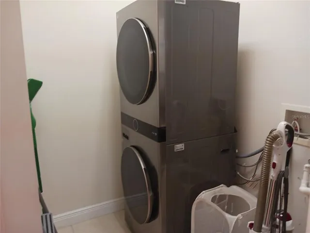 a bathroom with a toilet and a mirror