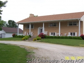325 Stockholm Road Paxton, IL 60957 - Photo 1 of 16 a front view of a house with garden