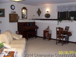325 Stockholm Road Paxton, IL 60957 - Photo 12 of 16 a living room with furniture and a fireplace