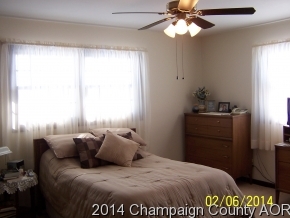 325 Stockholm Road Paxton, IL 60957 - Photo 9 of 16 a bedroom with a bed and a window