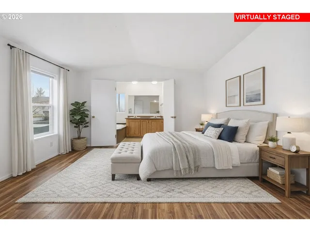 a view of a livingroom with wooden floor