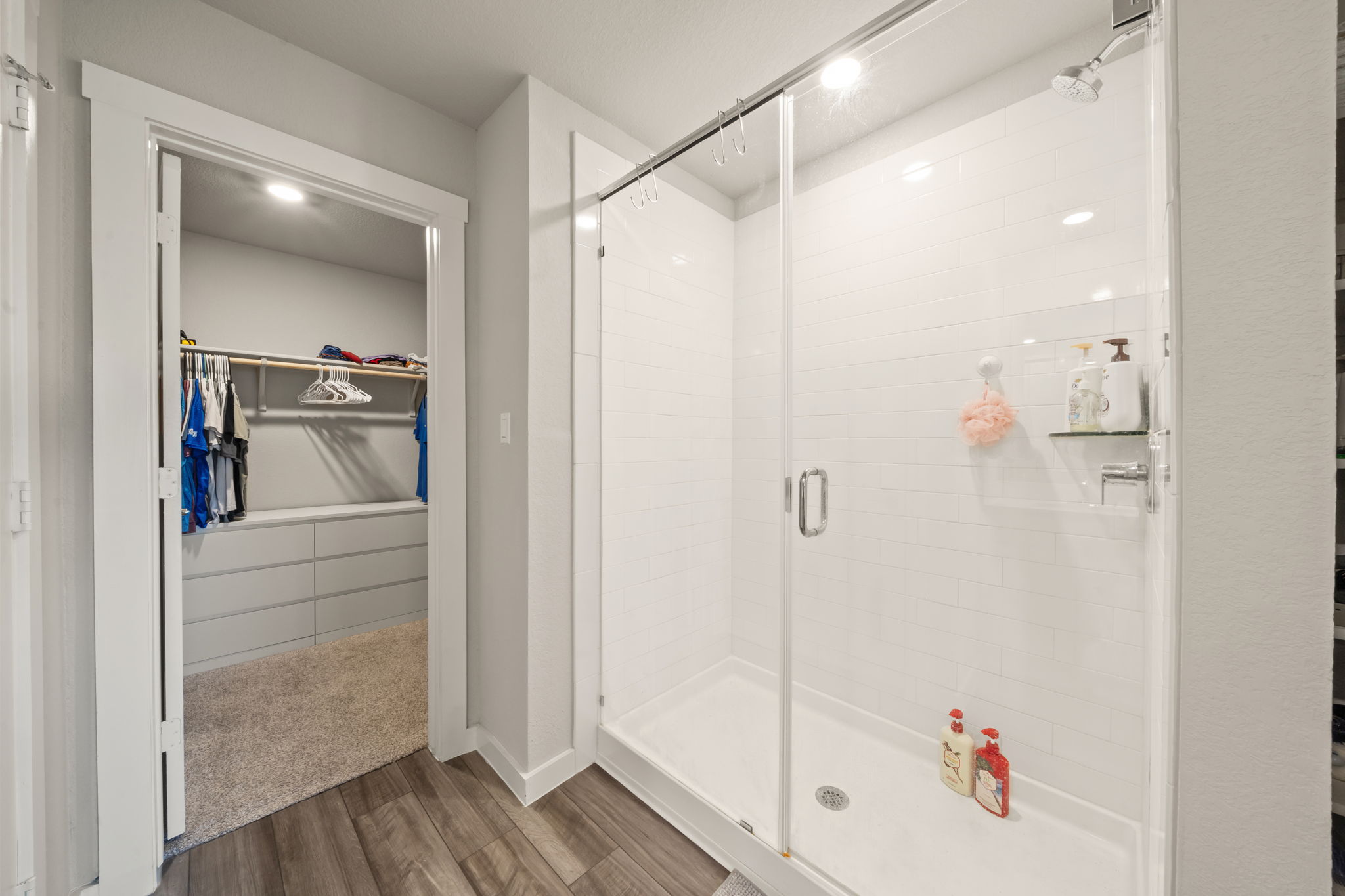 1117 Tipton Street Georgetown, TX 78633 - Photo 24 of 40 Glass-enclosed shower with subway tile surround and integrated shelving