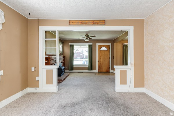 365 West 200 North Logan, UT 84321 - Photo 10 of 45 Carpeted floor with light beige walls and white trim