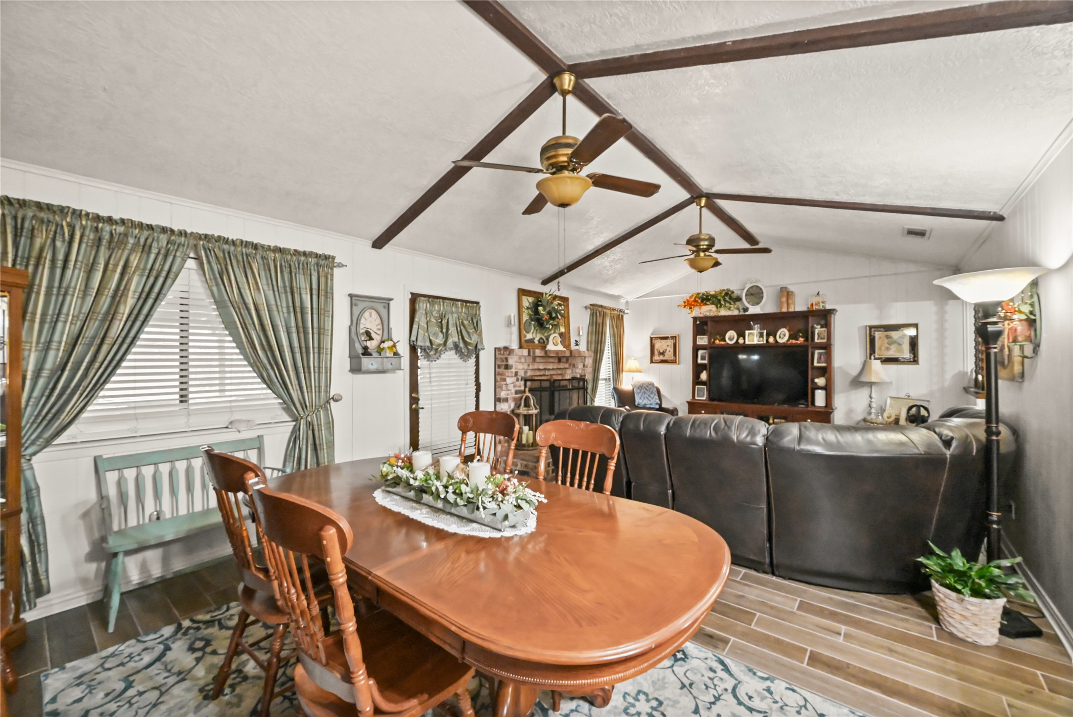 20135 Fox Grove Lane Humble, TX 77338 - Photo 11 of 34 a view of a dining room with furniture window and wooden floor