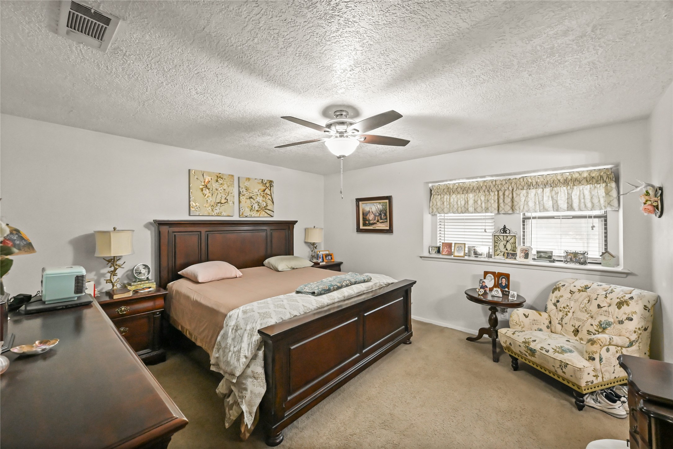 20135 Fox Grove Lane Humble, TX 77338 - Photo 19 of 34 a bed room with a bed and a couch