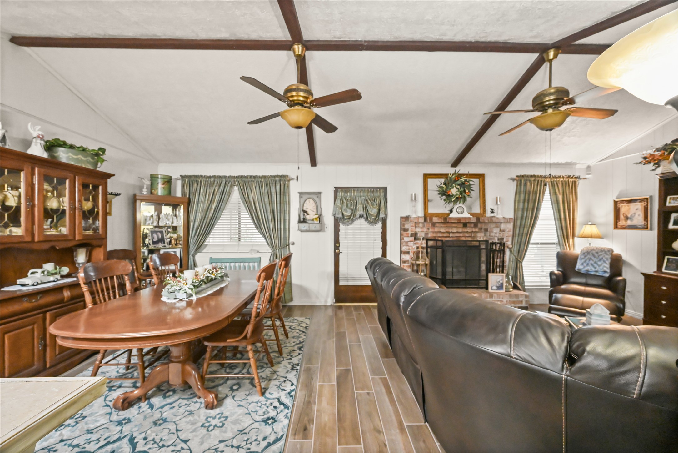 20135 Fox Grove Lane Humble, TX 77338 - Photo 25 of 34 a view of a livingroom with furniture window and wooden floor