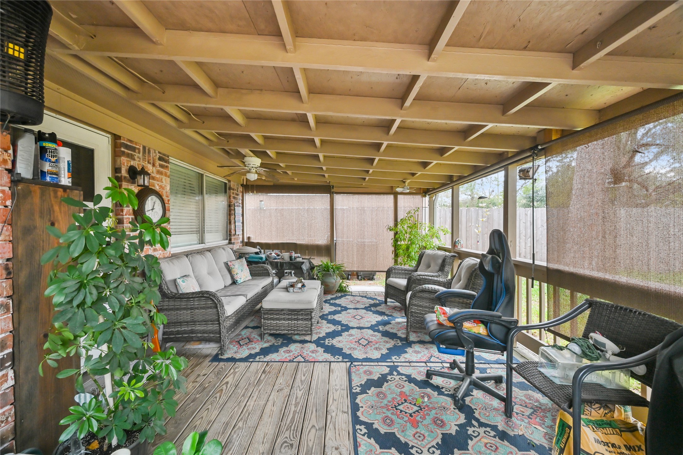 20135 Fox Grove Lane Humble, TX 77338 - Photo 27 of 34 a view of a patio with table and chairs and potted plants