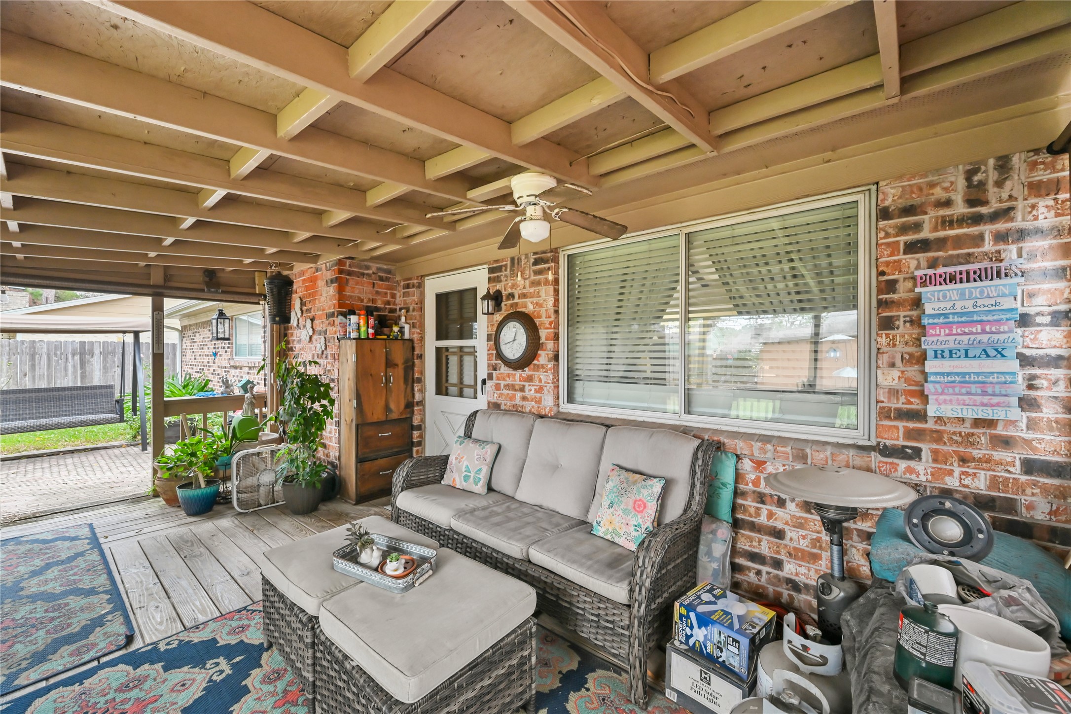 20135 Fox Grove Lane Humble, TX 77338 - Photo 28 of 34 a outdoor space with patio the couches and a dining table with the garden view