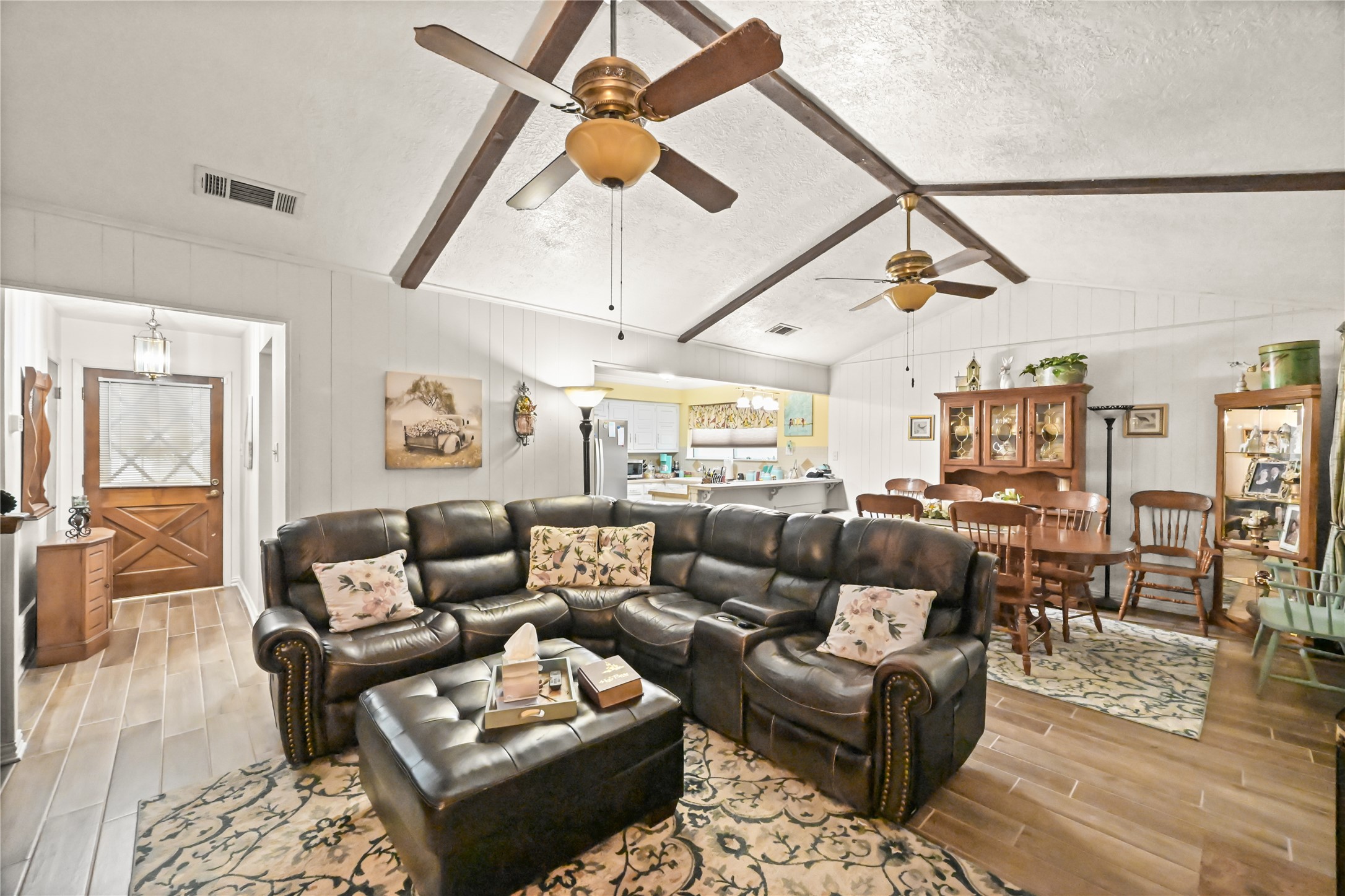 20135 Fox Grove Lane Humble, TX 77338 - Photo 5 of 34 a living room with furniture and a ceiling fan