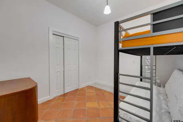 a view of entryway with a floor to ceiling window and interior