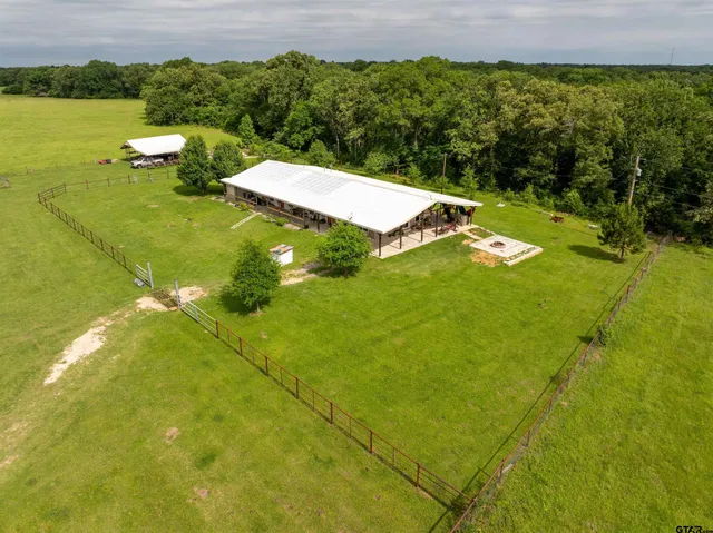 a view of a lake with a yard
