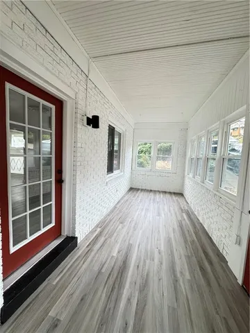 a view of outdoor space with deck and yard