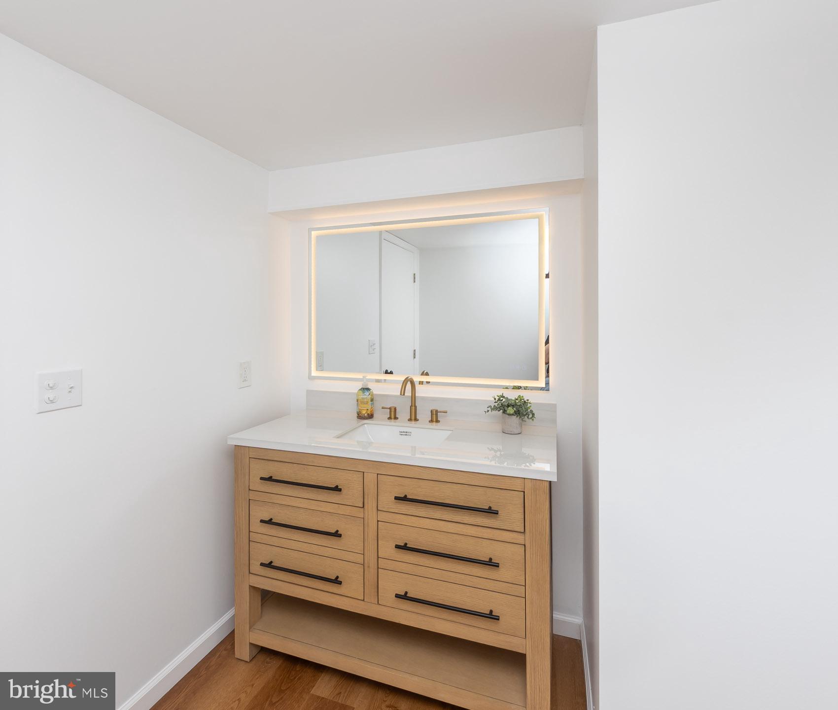 4516 East Joppa Road Perry Hall, MD 21128 - Photo 33 of 38 Sleek modern bathroom with warm tones.