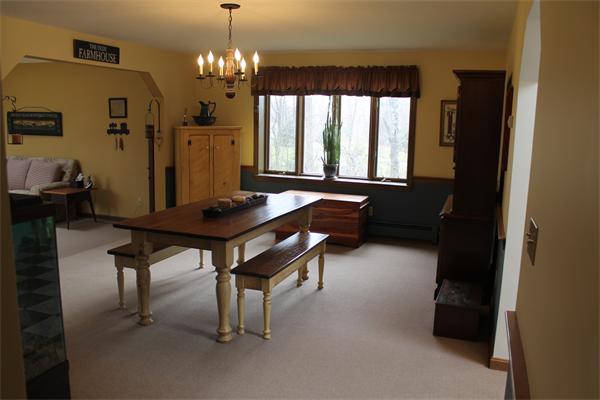 159 Northwest Road Spencer, MA 01562 - Photo 11 of 21 a room with chandelier furniture and a window
