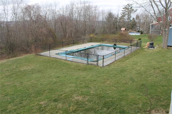159 Northwest Road Spencer, MA 01562 - Photo 3 of 21 a backyard of a house with table and chairs