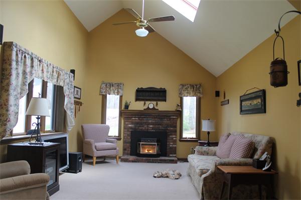 159 Northwest Road Spencer, MA 01562 - Photo 4 of 21 a living room with furniture and a fireplace