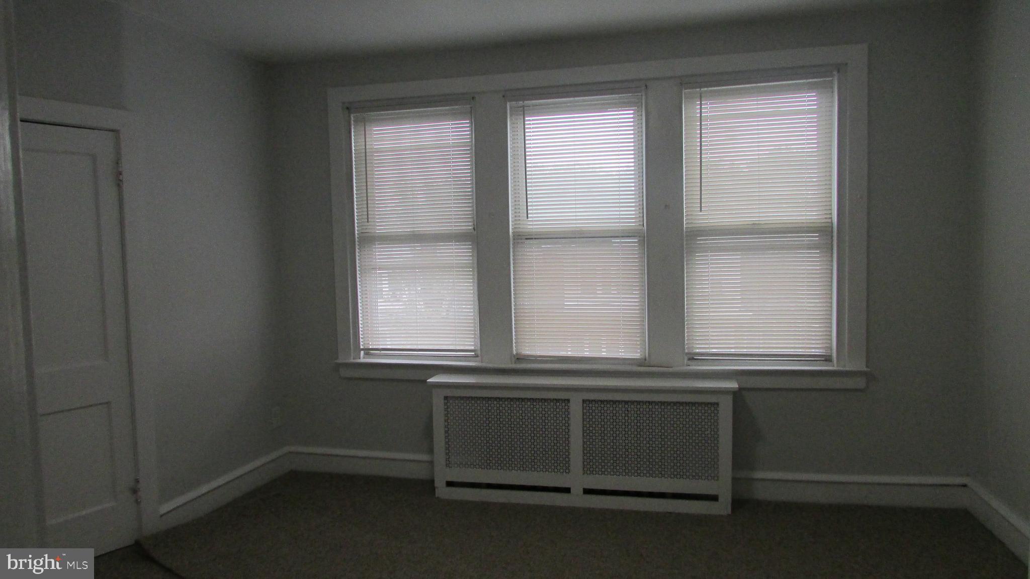 5324 Horrocks Street Philadelphia, PA 19124 - Photo 11 of 25 a view of an empty room with a window