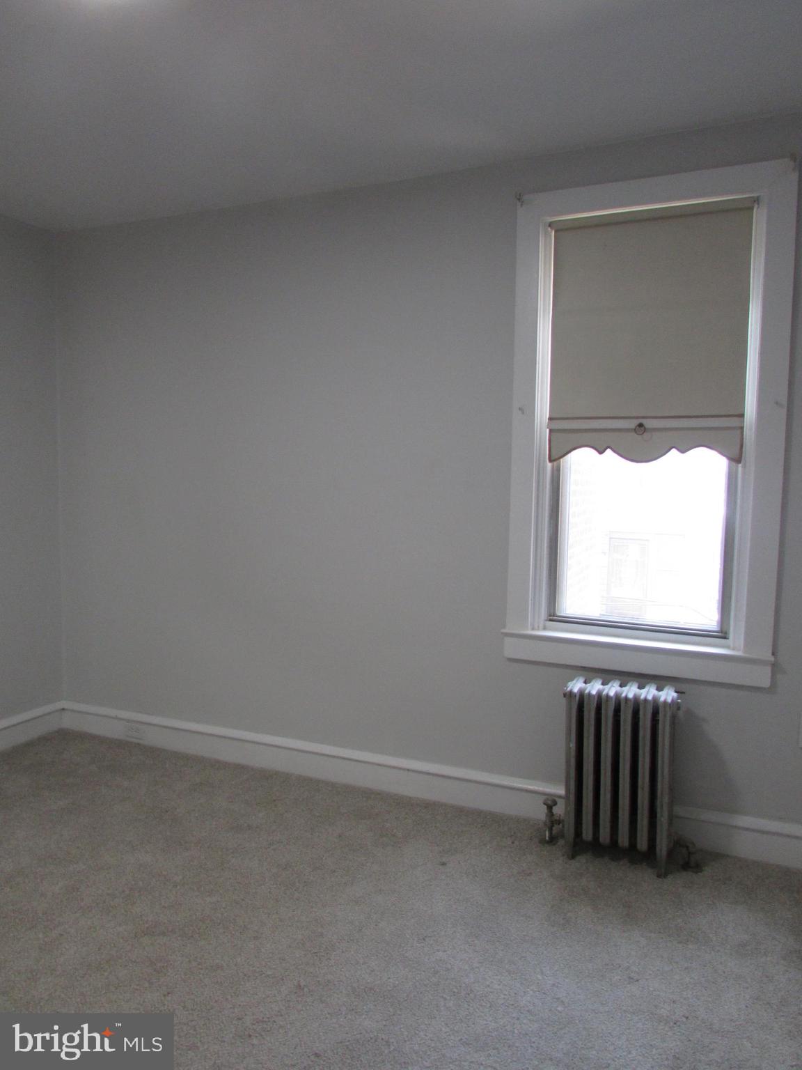 5324 Horrocks Street Philadelphia, PA 19124 - Photo 14 of 25 an empty room with a window