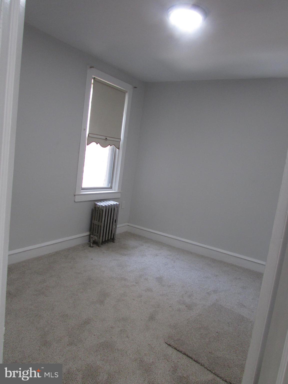 5324 Horrocks Street Philadelphia, PA 19124 - Photo 15 of 25 an empty room with windows