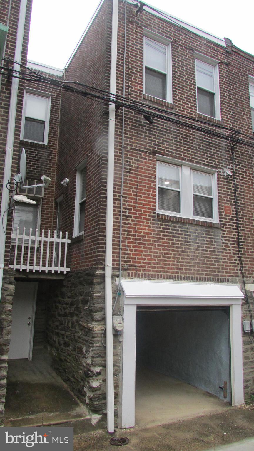 5324 Horrocks Street Philadelphia, PA 19124 - Photo 22 of 25 a front view of a house with glass windows