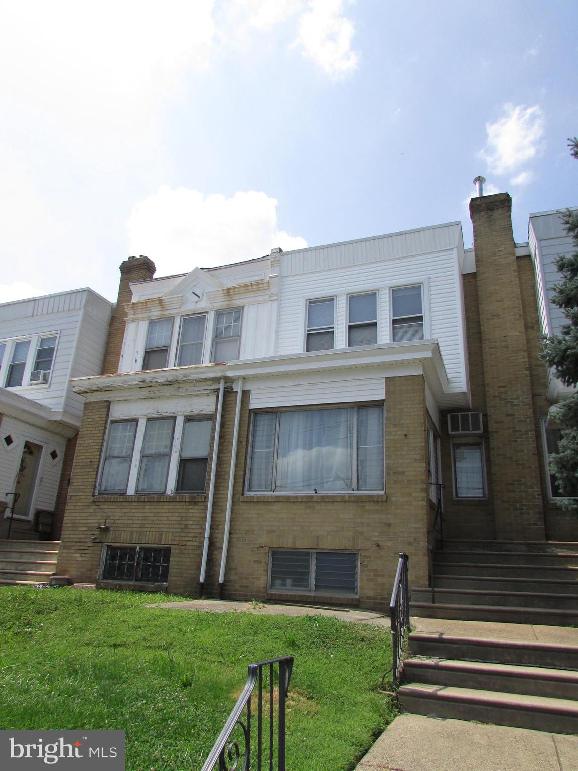 5324 Horrocks Street Philadelphia, PA 19124 - Photo 3 of 25 a front view of a house with garden