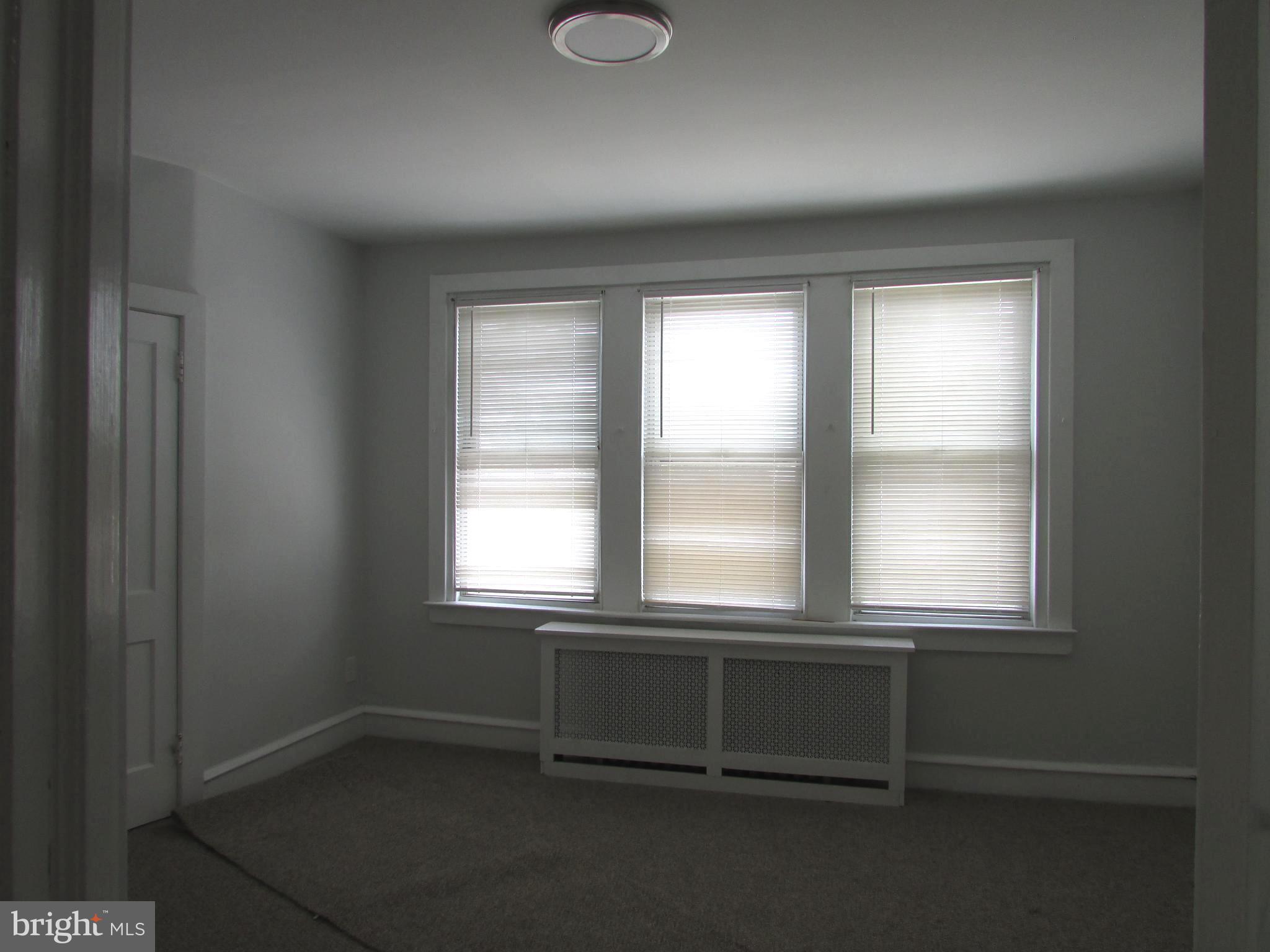 5324 Horrocks Street Philadelphia, PA 19124 - Photo 10 of 25 an empty room with a window